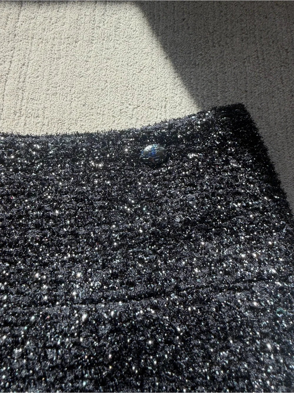 CHANEL Black Sparkle Tweed Mini Skirt with Quilted Hem